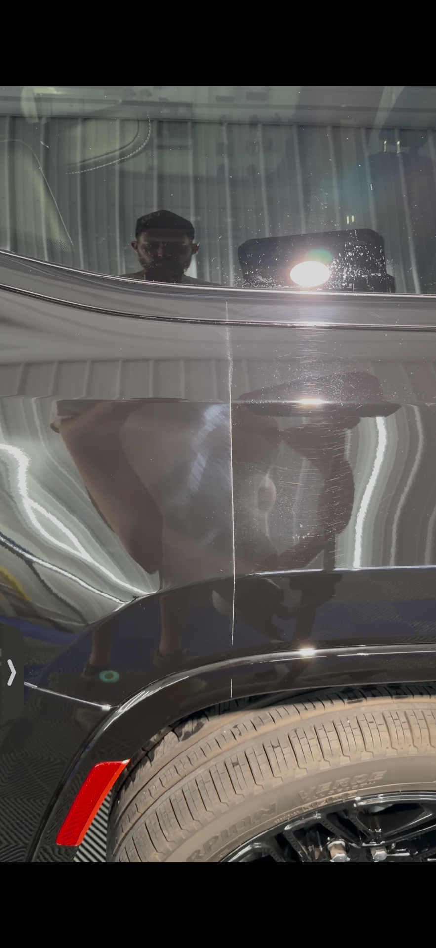 Paint inspection light showing the difference between swirled and corrected paint