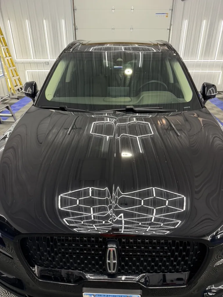 Lincoln sedan with a deep gloss finish after exterior detailing