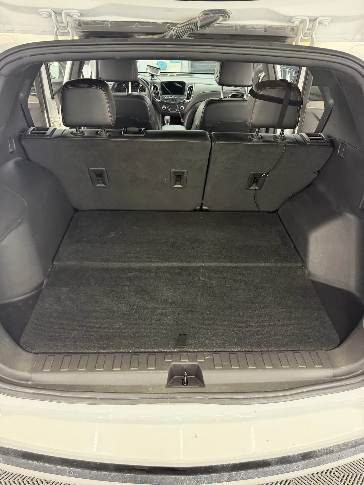 Trunk vacuumed and cleaned during an interior detail