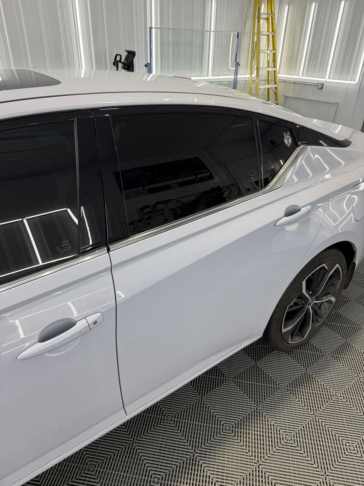 Tinted door glass on a detailed vehicle