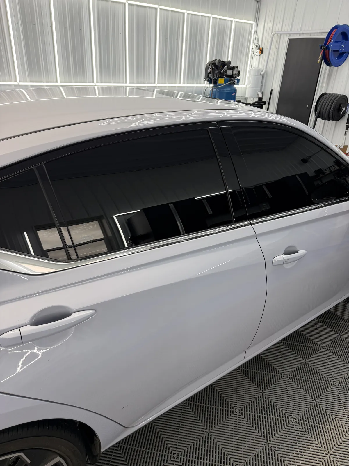 Close-up of tinted door glass